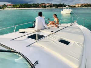 Couple enjoying a boat cruise near Playa del Carmen