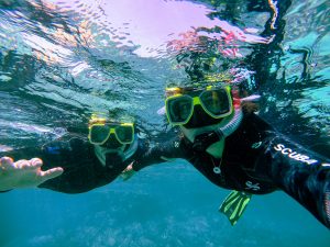 two person snorkeling at playa del carmen