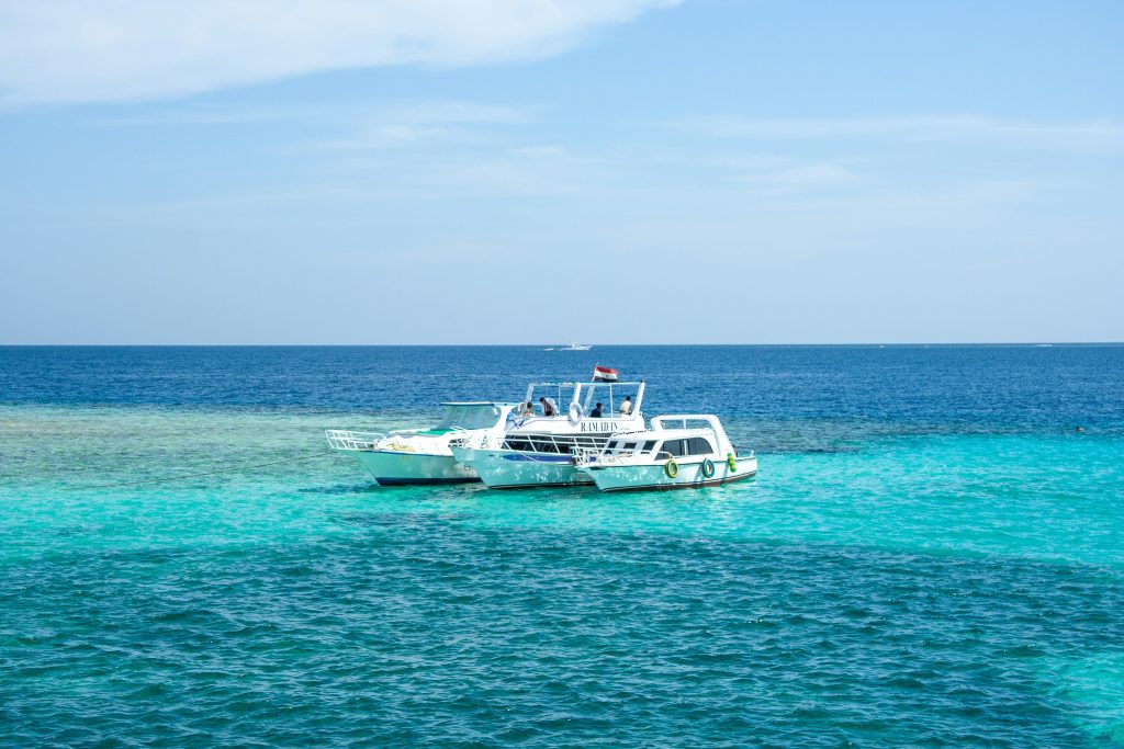 Private boat rental in Playa del Carmen cruising along the Caribbean coast