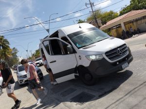 Private transportation van in Playa del Carmen picking up passengers for a snorkeling boat tour, providing convenient transfer service to the marina.
